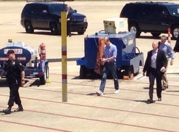 Prince William boarding the American Airlines flight.
