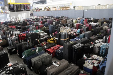 Thousands of passengers have been left without their bags thanks to an IT fault at Heathrow's Terminal 5, which left the complicated bag processing system out of order. Fliers landed in Africa and the U.S. without luggage after 30 miles of conveyor belts which usually move 12,000 bags a day were put out of action. (Courtesy: Daily Mail)